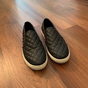 Black Steve Madden slip one tennis shoes